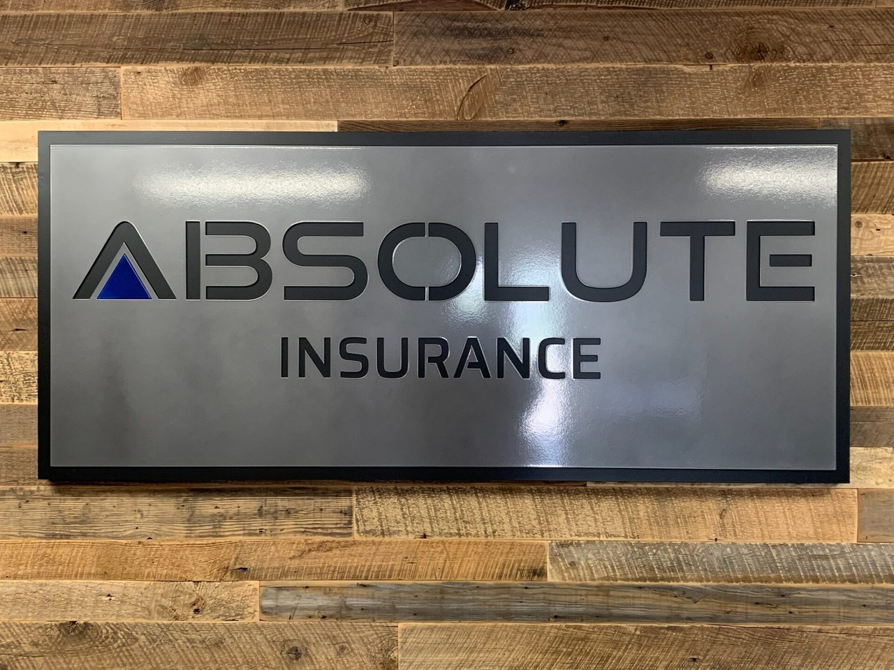Absolute Insurance Agency sign at the West Fargo, ND office